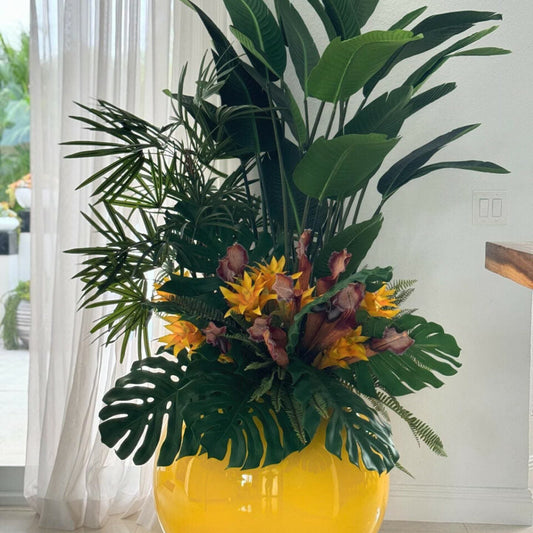 Mix of Tropical Plants in Yellow Globe Pot